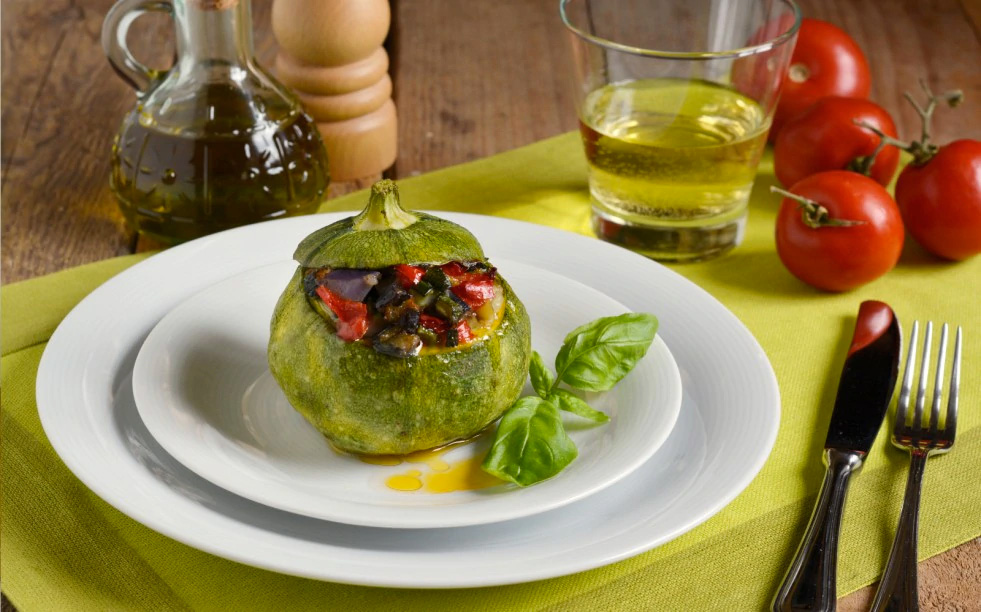 Zucchine tonde ripiene di verdure e non solo