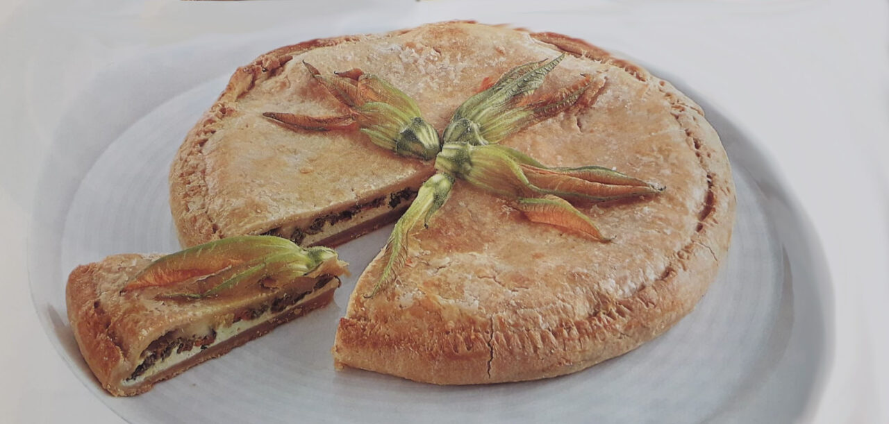 Torta di formaggio e fiori di zucchine